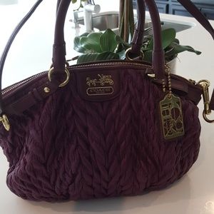 Purple coach handbag